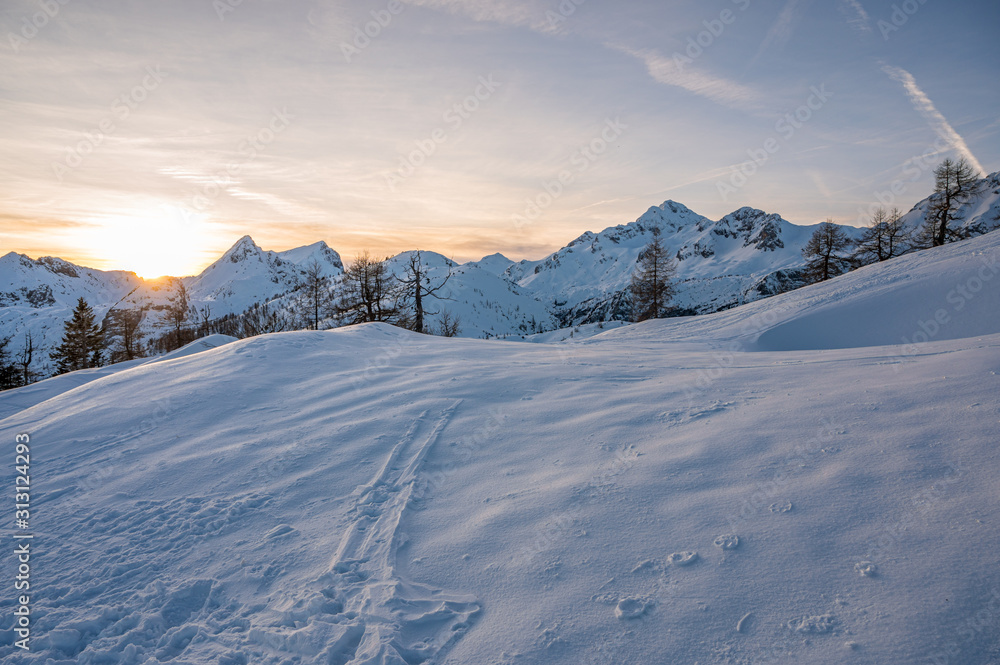 Spectacular winter mountain panoramic view of mountains at sunset. Spectacular winter mountain panoramic view of mountains at sunset.