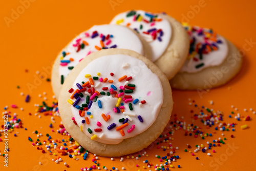 Obraz na plátne Sprinkle cookies with vanilla icing