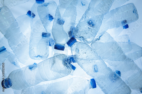 Abstract background of plastic bottles (Polyethylene Terephthalate or PET bottle). Global warming and World environmental concept