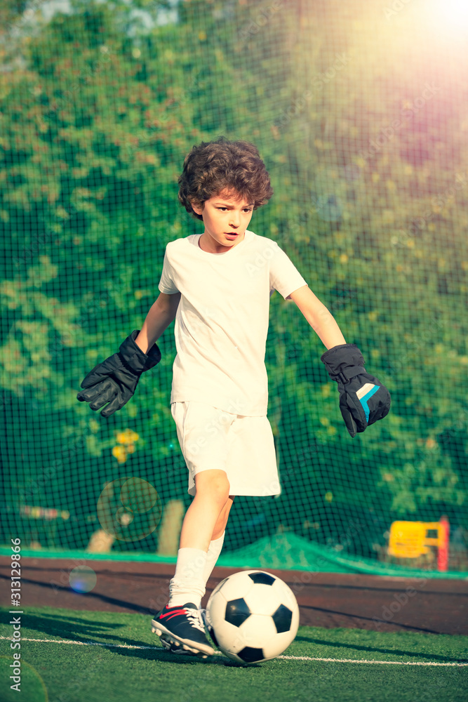 Children's soccer football - a match of young children on the football field Children's soccer football - a match of young children on the football field