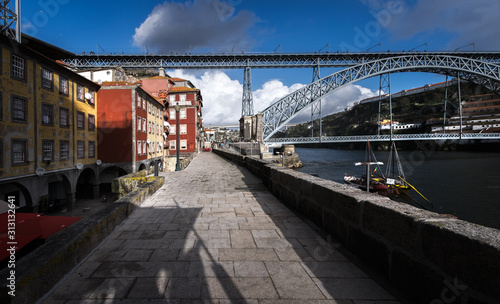 View of the bridge of the city of Porto and the promenade. The river Duoro. Portugal.