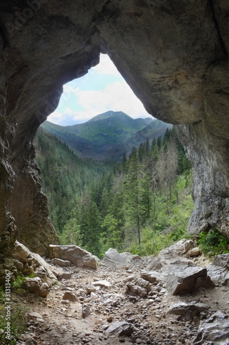 View from interior of Jaskinia Mylna cave in Polish Tatra Mountains