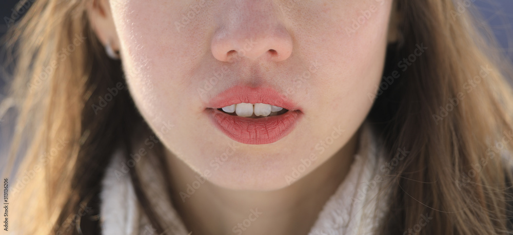 open beautiful female lips with pink lipstick and white teeth open beautiful female lips with pink lipstick and white teeth
