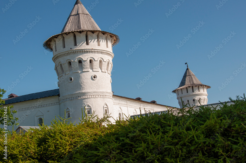 Historical and Architectural Museum-Reserve with Kremlin and round ancient tower from white brick