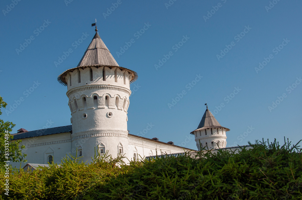 Historical and Architectural Museum-Reserve with Kremlin and round ancient tower from white brick