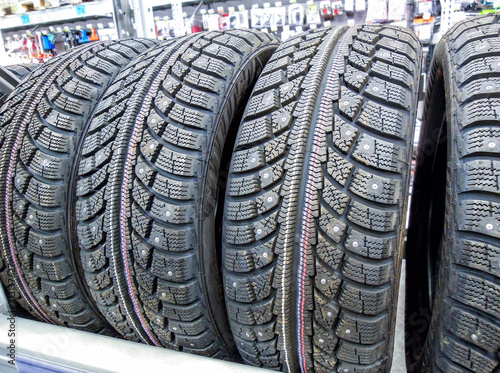 Winter vehicle tires stacked up for sale in the hypermarket