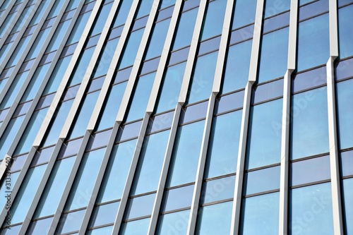 The windows of a modern building for offices. Business buildings architecture.