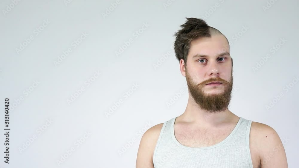 Half-head hair,the other bald.Haircut before and after.Place for text.Copyspace. Half-head hair,the other bald.Haircut before and after.Place for text.Copyspace.