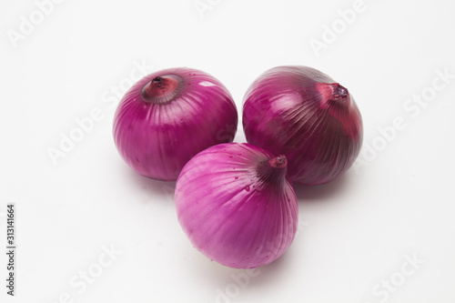 Red onions on a white