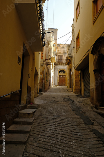 Narrow footpath cobblestone street in Sciacca  Province of Agrigento  Sicily  Italy. 09 01 2019