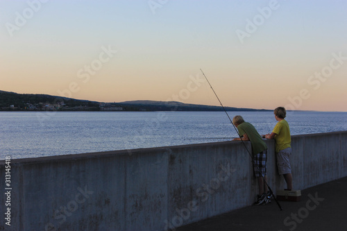 Children fishing on Lake Superir