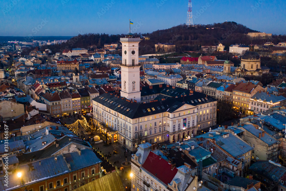 View on Lviv city hall at night from drone