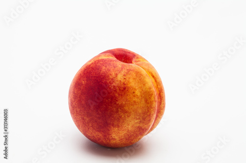 Fresh ripe Peach on a white background 