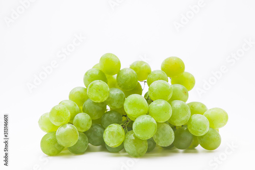 Bunch of green grapes isolated on a white 