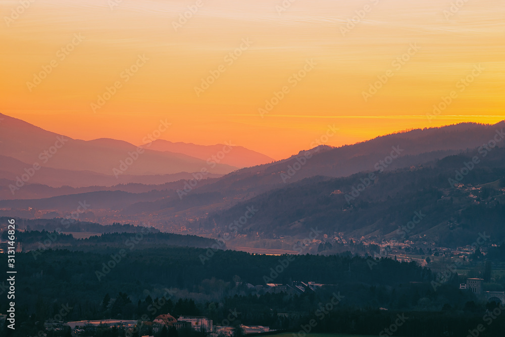 Romantic sunset over hills with vineyards in Maribor in Slovenia in Lower Styria in Europe. Nature in spring in Slovenija. Vine cesta landscape on Piramida or Pyramid hill