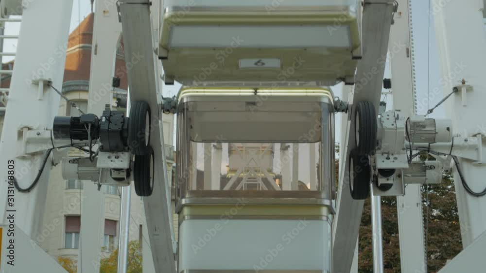 Ferris wheel cabins rotation engine wheels mechanism big white carousel ...