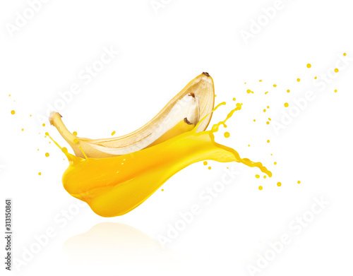 Splashes of fresh juice with banana on a white background