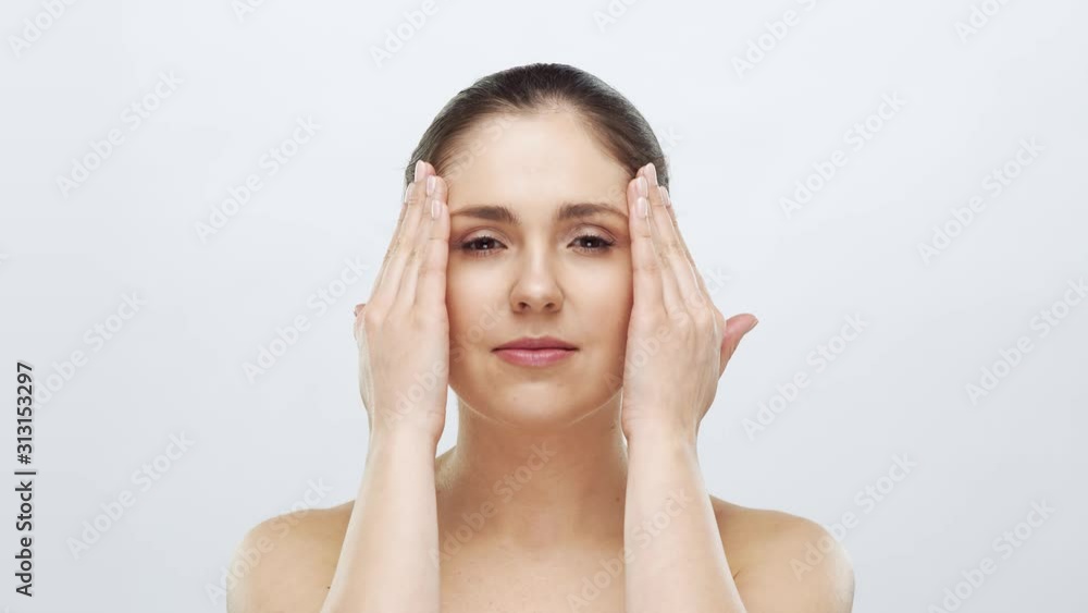 Studio portrait of young, beautiful and natural blond woman applying skin care cream. Face lifting, cosmetics and make-up. Studio portrait of young, beautiful and natural blond woman applying skin care cream. Face lifting, cosmetics and make-up.