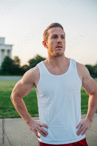 Handsome Caucasian man portrait while resting during a workout outdoors at the National Mall in Washington DC
