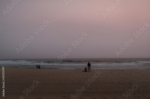 Sydney s Bronte Beach with tourists waiting for dawn