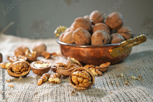 Walnuts. Composition with wallnuts on the sackcloth. Nuts on the table.