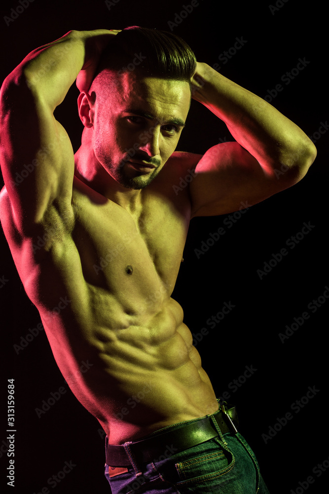 A man with a perfect body. The guy in the jeans. The naked male body. Sexy  young man. Stock Photo | Adobe Stock