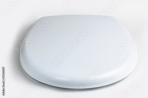 on a white background, a toilet lid. close-up. isolation.