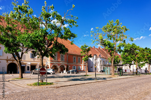 Fototapeta Naklejka Na Ścianę i Meble -  Main square in small spa town on thermal springs Bad Radkersburg in Styria in Austria. Street view in Austrian city. Building architecture.