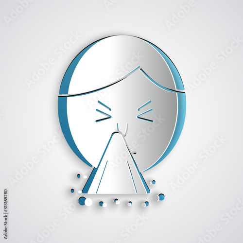 Paper cut Man holding handkerchief or napkin to his runny nose icon isolated on grey background. Coryza desease symptoms. Paper art style. Vector Illustration