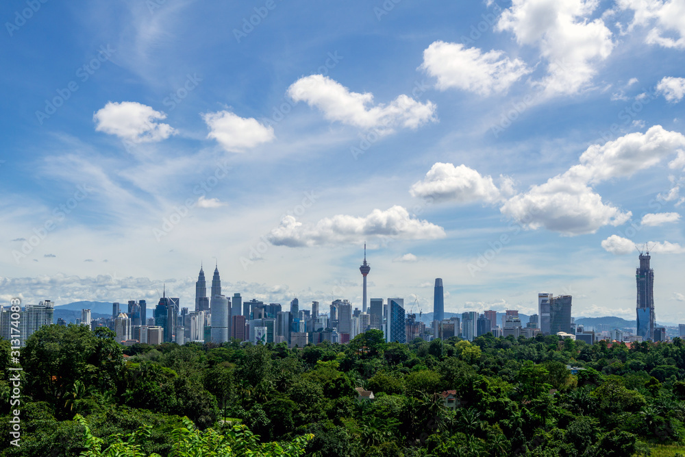 Fototapeta premium View of monsoon clouds over downtown Kuala Lumpur, Malaysia