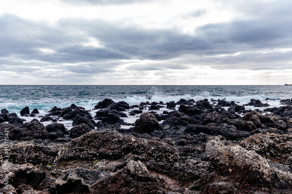 Beautiful view over the Volcanic Rocks with the Atlantic Ocean in the Background, São Roque, Ponta Delgada, São Miguel Island, Azores Beautiful view over the Volcanic Rocks with the Atlantic Ocean in the Background, São Roque, Ponta Delgada, São Miguel Island, Azores