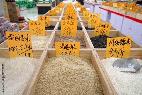 Canvas Print Shanghai,China-September 15, 2019: Varieties of rice sold in a market in Shangha