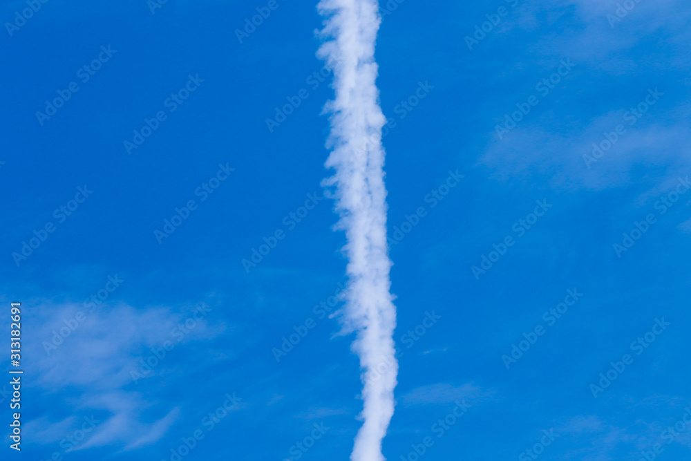 Contrails of airplan on blue sky background Contrails of airplan on blue sky background