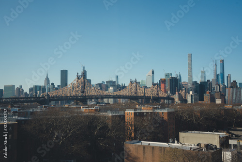 Fototapeta Naklejka Na Ścianę i Meble -  New York City Skyline View with Iconic Bridge and Cityscape 