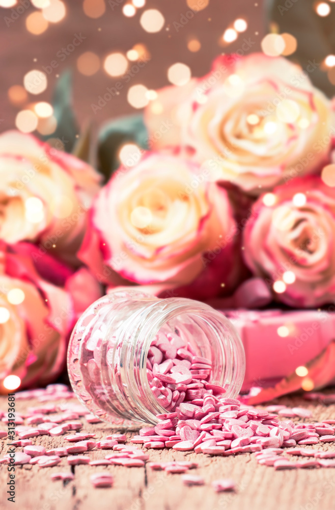 Pink sweet heart, Valentines Day card on of fresh pink and red roses with bokeh, selective focus Pink sweet heart, Valentines Day card on of fresh pink and red roses with bokeh, selective focus