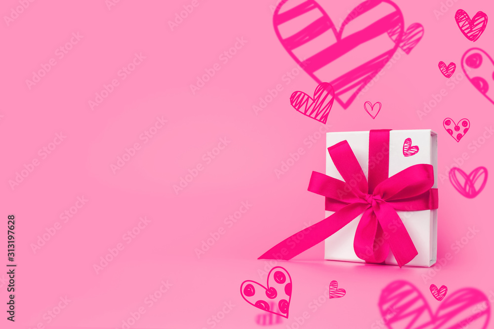 Valentine's Day background. Gift box on pastel pink background. Valentines day concept. Copy space