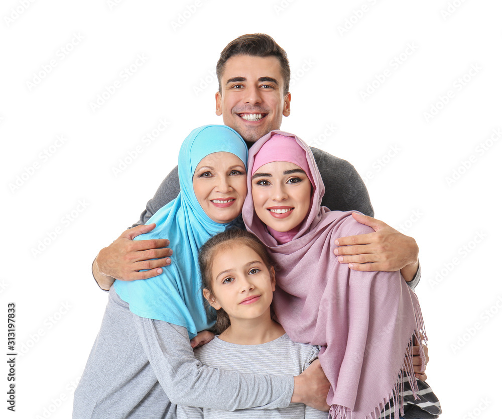 Fototapeta premium Portrait of Muslim family on white background