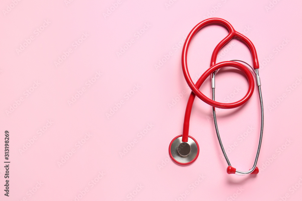 Modern stethoscope on color background Modern stethoscope on color background