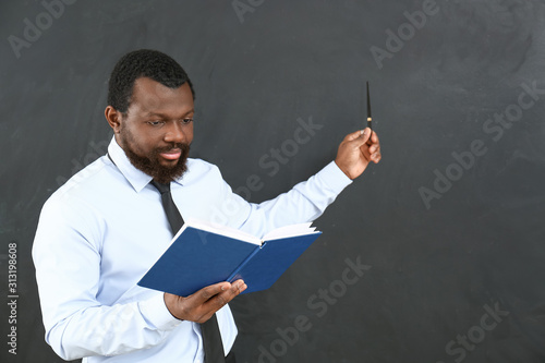 African-American teacher po...