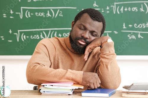 African-American teacher sl...