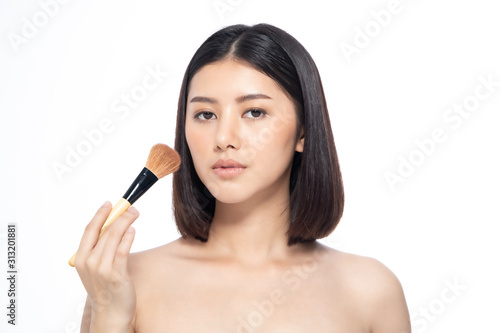 Beautiful Young Asian Woman short hair  with Clean Fresh Skin. Face care, Facial treatment, Cosmetology, beauty and healthy skin and cosmetic ideas concept.