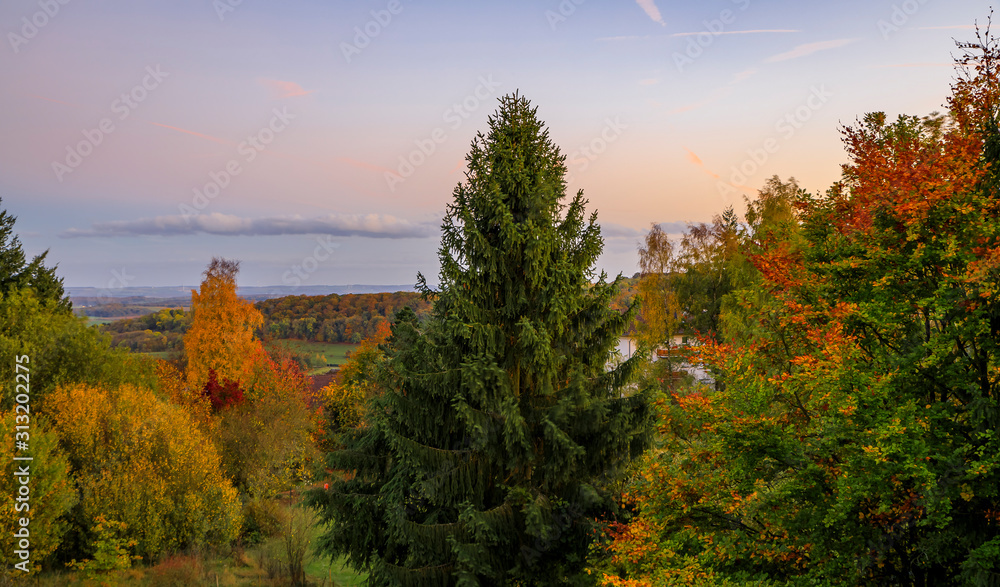 Beautiful fall view of a valley and a Grunewald forest beyond in Senningerberg Luxembourg known for green natural spaces