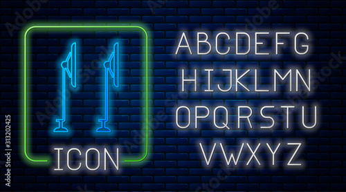 Glowing neon Windscreen wiper icon isolated on brick wall background. Neon light alphabet. Vector Illustration