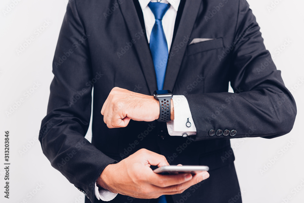 Business man wearable smart watch on hand and he is sync smarteatch to smartphone, Business man wearable smart watch on hand and he is sync smarteatch to smartphone,