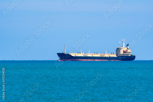 Logistics and Transportation of international Container Cargo ship and Cargo plane in the sea.