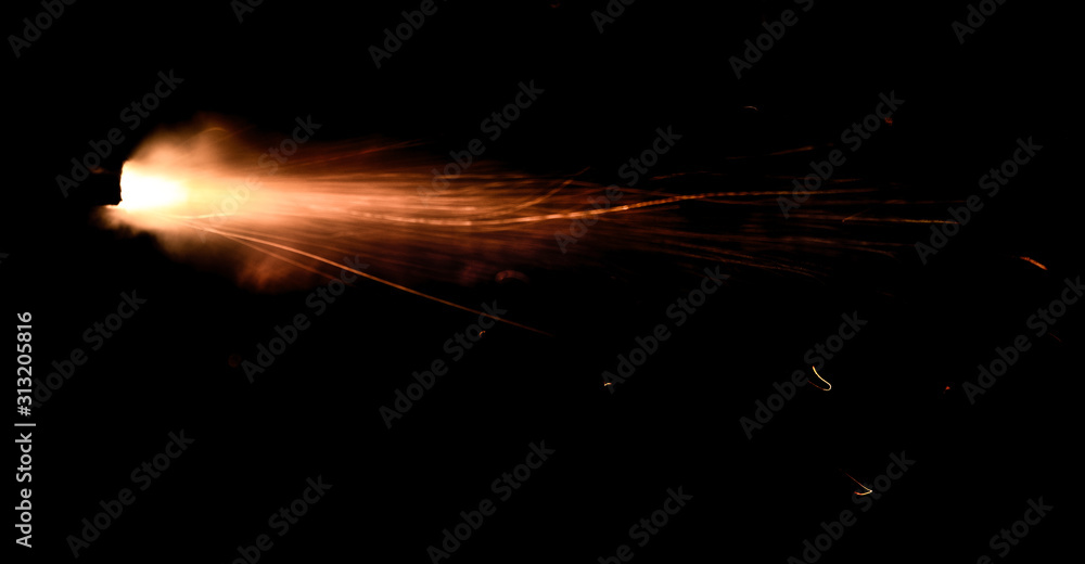 the texture of a shot from a firearm on a black background, the output ...