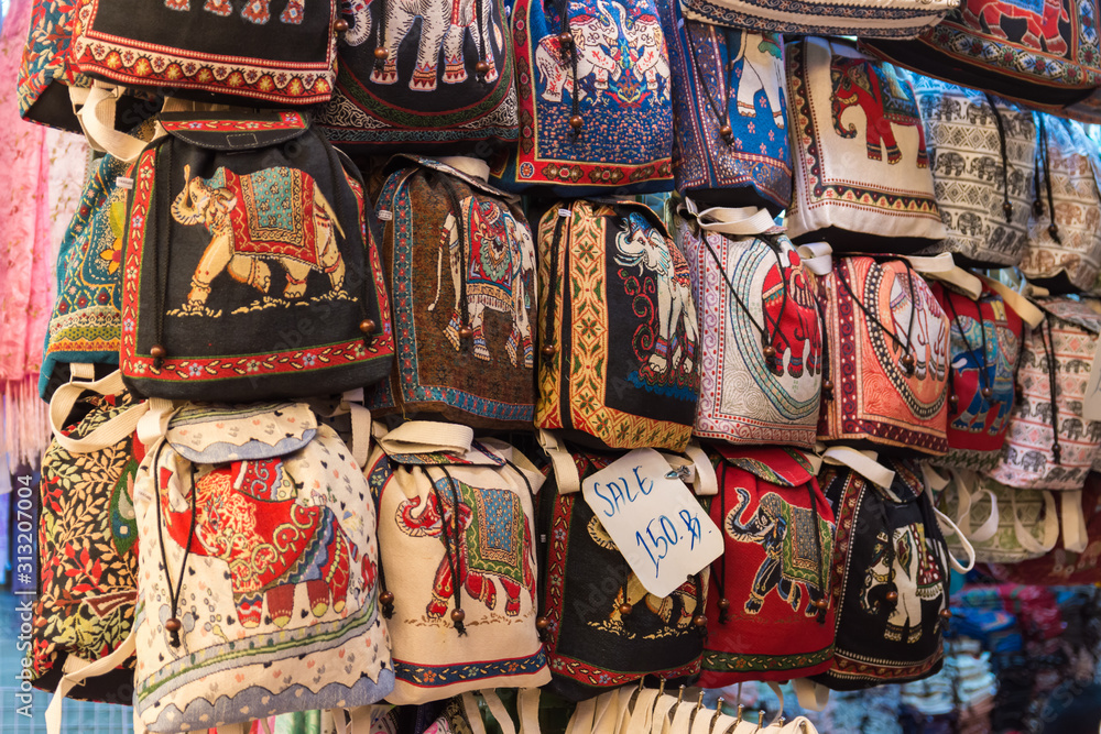 Handicraft elephants weave backpack selling at the market in Bangkok,Thailand.