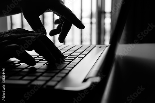 Murais de parede hacker or cyber crime hand reaching, stealing information on laptop, attack sign