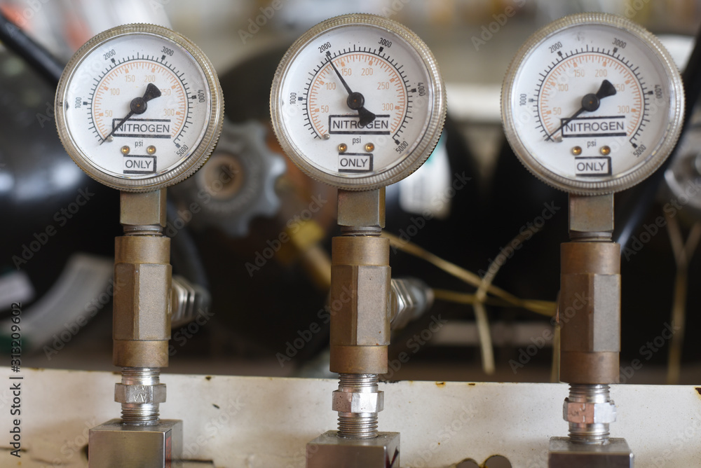 Close up on high pressure gauges. Close up on high pressure gauges.