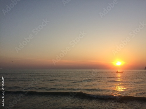 At dawn on the beach this landscape will be more relaxed! The sunrise The sun and the sound of waves ..!